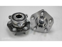 1044123-00-A / RM930664 / The rear wheels of the Tesla Model 3